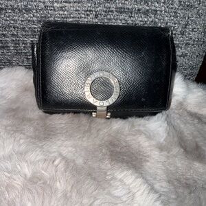 Bulgari Black Leather Clutch with Silver Snap clip for front closure.